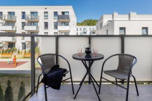 Nadmorskie Tarasy Apartment with Balcony Parking Gdynia by Renters