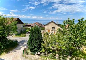 Sejours chez l'habitant Maison familiale vue lac avec jardin - a 10mn du lac et stations de ski : photos des chambres