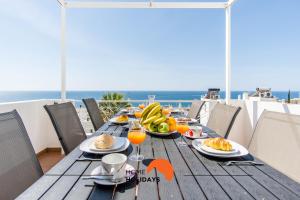 #052 V4 Mimosas by Home Holidays