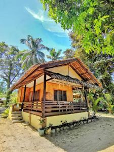 Besaga Beachfront B&B - Port Barton