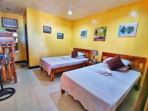 Besaga Beachfront B&B - Port Barton