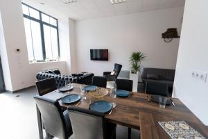 Appartements LOFT LA MINE D'OR - Parking gratuit et prive - Wifi - Tout equipe - Machine a laver : photos des chambres