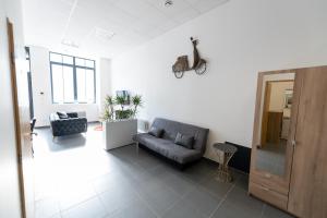 Appartements LOFT LA MINE D'OR - Parking gratuit et prive - Wifi - Tout equipe - Machine a laver : photos des chambres