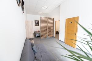 Appartements LOFT LA MINE D'OR - Parking gratuit et prive - Wifi - Tout equipe - Machine a laver : photos des chambres