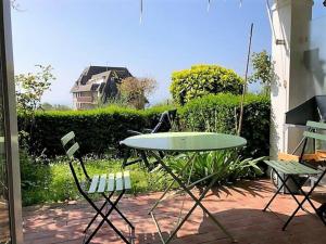 Appartements Au petit jardin Trouville by Conciergerie d'Audrey : photos des chambres