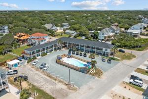 The Beach House at Oak Island by Carolina Resorts