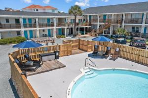 The Beach House at Oak Island by Carolina Resorts