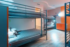 Bed in Female Dormitory Room room in Art-hotel Zontik