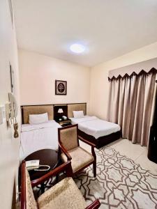 Studio Standard Room with Twin Beds room in Dream Palace Hotel