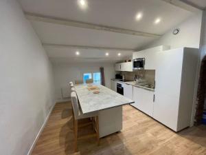 Appartements Duplex sous les toits : photos des chambres