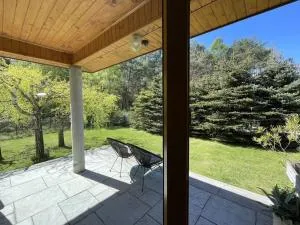 House on the edge of forest by Zalew Sulejowski - Bronisławów