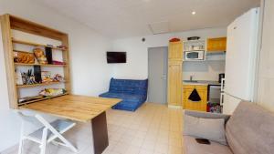 Appartements La Petite Maison de la Roseraie : photos des chambres