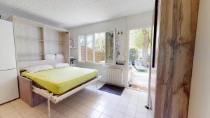 Appartements La Petite Maison de la Roseraie : photos des chambres