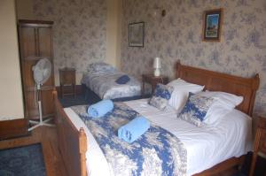 B&B / Chambres d'hotes Le Logis des Quatre Puits : photos des chambres