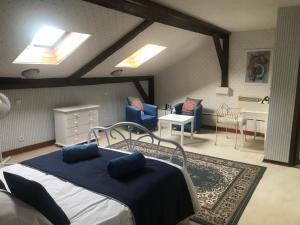 B&B / Chambres d'hotes Le Logis des Quatre Puits : photos des chambres