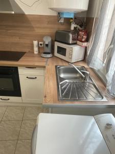 Appartements Studio a 4 min plages : photos des chambres