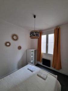 Appartements Le Jungle - Lourdes - Proche Sanctuaire : photos des chambres