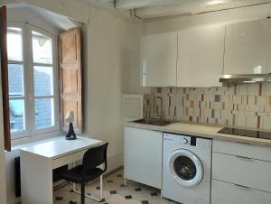 Appartements Studio Cosy en centre ville : photos des chambres