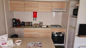 Campings Mobilhome 3ch N°727 tout equipe et confortable : photos des chambres