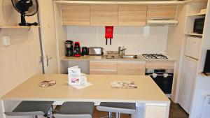 Campings Mobilhome 3ch N°727 tout equipe et confortable : photos des chambres