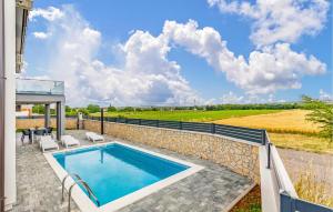 Amazing Home In Pula With Outdoor Swimming Pool, Wifi And 2 Bedrooms