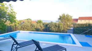 Modern apartment with heated pool&sea view