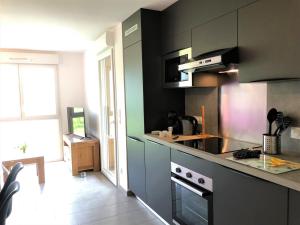 Appartement moderne avec terrasse et parking privé - FR-1-165A-178