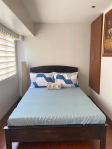 Comfy and Cozy 2BR Condo in BGC with WiFi and Netflix