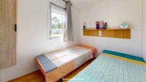 Maisons de vacances Camping Officiel Siblu Le Marisol : photos des chambres