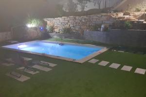 Villas Magnifique villa avec piscine et vue panoramique : photos des chambres