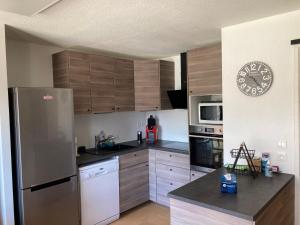 Appartement Duplex Les Orres 1800 pour 8 personnes aux pieds des pistes avec ménage et une place de parking inclus
