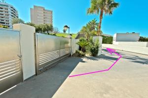 On Beach Deluxe Apartment with Pools and own Garden