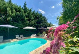 Maisons d'hotes Le Petit Prince a Sarlat - Parking prive - piscine chauffee - espace bien-etre Jacuzzi et massages : photos des chambres