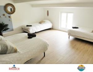 Appart'hotels Little America - Appart Hotel 3km Futuroscope : photos des chambres
