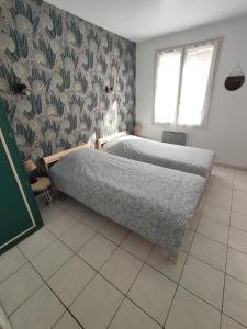 Appartements T4 - Charmant Appartement a Saint Aignan : photos des chambres