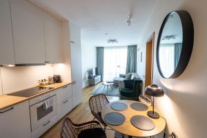 3 kambarių šeimos apartamentai su terasa Kunigiškių gatvėje