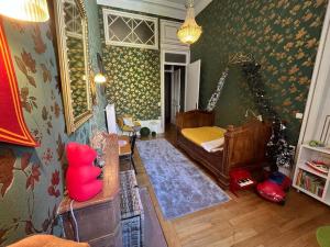 Appartements Hotel particulier de 1734 - avec Parking - Plein centre-ville : photos des chambres