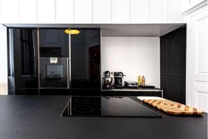 Appartements Hotel particulier de 1734 - avec Parking - Plein centre-ville : photos des chambres
