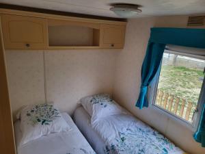 Sejours a la ferme Mobil Home a la ferme : photos des chambres