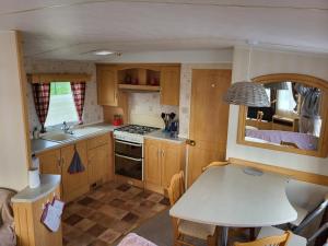 Sejours a la ferme Mobil Home a la ferme : photos des chambres