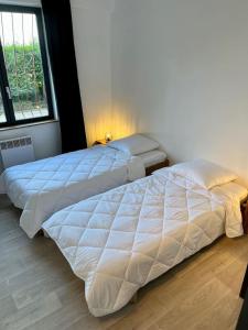 Appartements Les Carrieres : photos des chambres