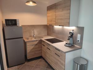 Appartements Jardin de Coubertin : photos des chambres