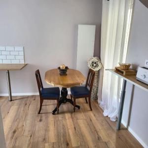 Appartements La Petite Reine et son parking : photos des chambres