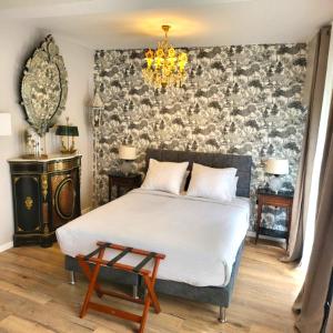 Appartements La Petite Reine et son parking : photos des chambres