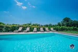 Maisons de vacances Mazet au calme -Piscine privee-Grand jardin arbore : photos des chambres