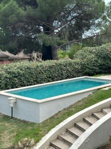 Appartements Appartement F2 climatise dans villa avec piscine : photos des chambres