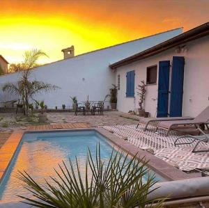 Maisons de vacances Maison au calme avec piscine. Pezenas. : photos des chambres