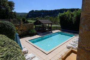 Appartements Cosy gite with magnificent view, private terrace and shared swimming pool : photos des chambres