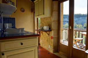 Appartements Cosy gite with magnificent view, private terrace and shared swimming pool : photos des chambres