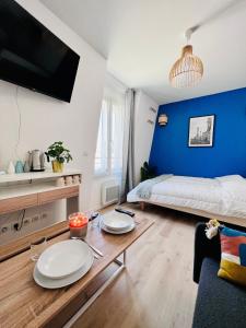 Appartements La vie en bleu - Studio proche de Paris : photos des chambres